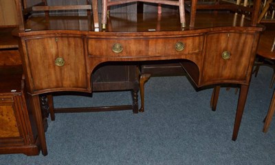 Lot 1105 - A 19th century serpentine fronted mahogany sideboard