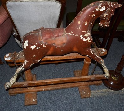 Lot 1110 - A child's painted rocking horse (heavily wormed)