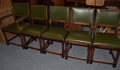 Lot 1112 - A set of five (4+1) 1920's oak dining chairs, fluted front legs