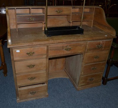 Lot 1122 - A pine pedestal desk