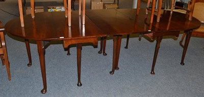 Lot 1130 - A 19th century mahogany D-end dining table with additional leaf and drop ends