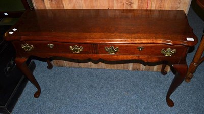 Lot 1134 - Reproduction mahogany two drawer side table