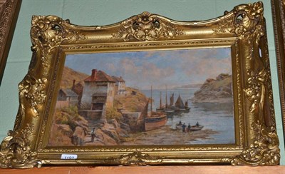 Lot 1192 - An oil on canvas depicting fishing boats with figures, signed W A Moody