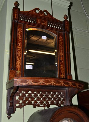 Lot 1232 - An inlaid rosewood wall mirror/shelf