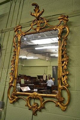 Lot 1234 - A reproduction gilt framed mirror