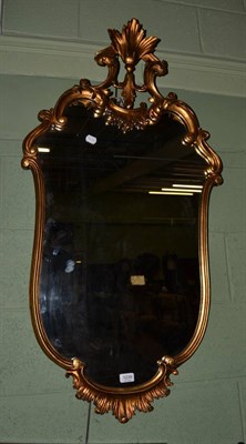 Lot 1239 - A reproduction gilt framed mirror