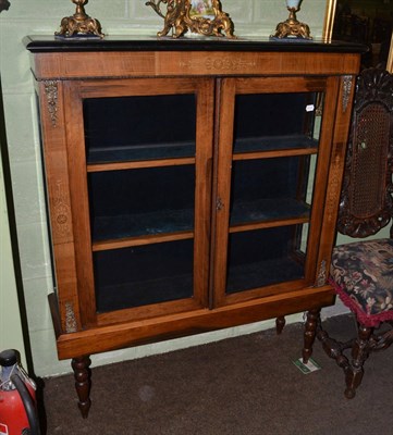 Lot 1241 - A Victorian inlaid display cabinet (later added legs)