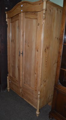 Lot 1250 - A pine wardrobe