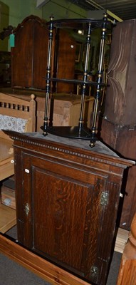 Lot 1255 - A George III oak hanging corner cupboard together with a Regency ebonsised and parcel gilt...