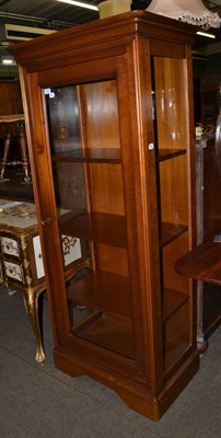 Lot 1264 - A reproduction glazed display cabinet