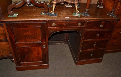 Lot 1274 - A Georgian mahogany kneehole desk