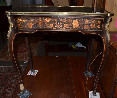 Lot 1277 - A French table with later marquetry