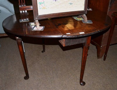 Lot 1284 - An 18th century oak pad foot table