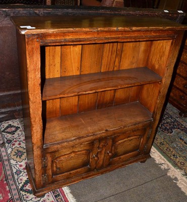 Lot 1295 - An oak open bookcase, probably Titchmarsh & Goodwin