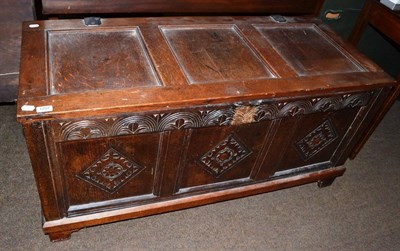 Lot 1297 - An 18th century and later carved oak blanket chest