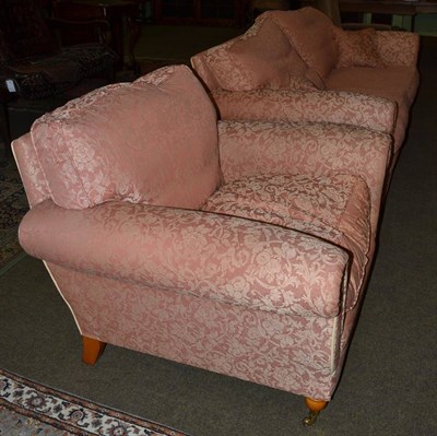 Lot 1305 - A two piece suite comprising a three seater sofa and a matching chair