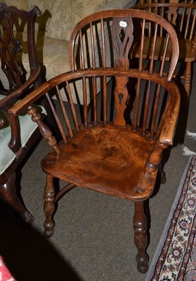 Lot 1324 - A 19th century elm Windsor chair with crinoline stretcher