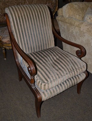 Lot 1328 - A mahogany open armchair with striped upholstery