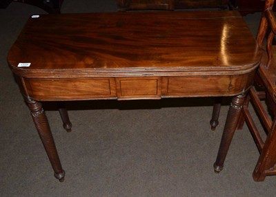 Lot 1339 - A mahogany fold over tea table