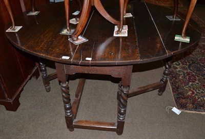 Lot 1344 - An 18th century oak gateleg table