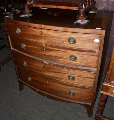 Lot 1352 - A George III four height chest of drawers (faded)