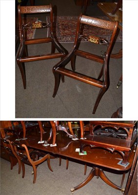 Lot 1364 - A mahogany twin pedestal dining table together with a set of ten matching chairs including two...