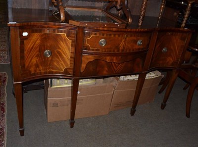 Lot 1368 - A brass inlaid mahogany serpentine fronted sideboard (en suite with previous lot)