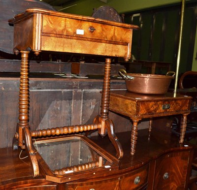 Lot 1369 - A 19th century German walnut sewing table, a low table, a framed wall mirror and a copper pan (4)