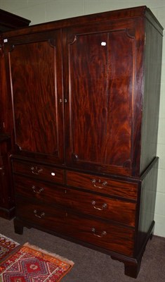 Lot 1379 - A George III mahogany linen press