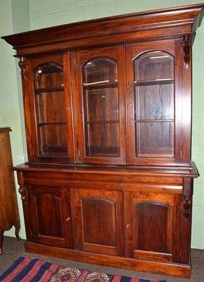 Lot 1380 - A reproduction bookcase cabinet with glazed upper section