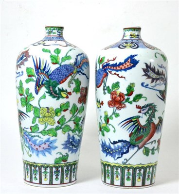 Lot 7 - A pair of Japanese polychrome decorated vases, 30cm high