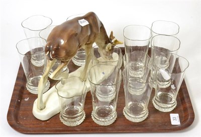 Lot 33 - A Continental ceramic model of a faun together with a suite of drinking glasses