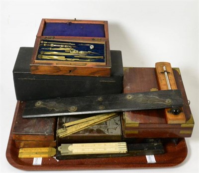 Lot 34 - A collection of George III and later architect drawing instruments and rules (some cased and...
