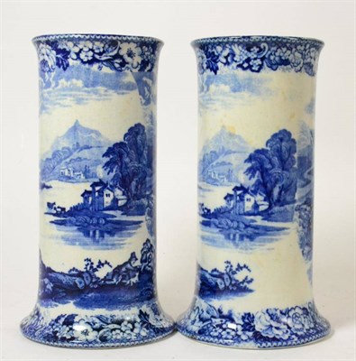 Lot 35 - A pair of Prattware blue and white vases depicting lakeland scenes, 22cm high