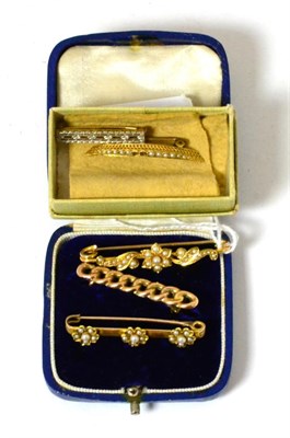 Lot 67 - Three pearl set bar brooches and two other brooches (a.f.)