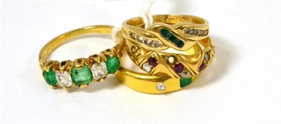Lot 89 - An emerald and diamond three stone ring, an emerald and diamond five stone ring, a ruby and diamond
