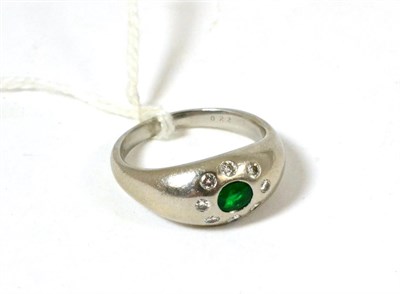 Lot 93 - A platinum, diamond and emerald ring