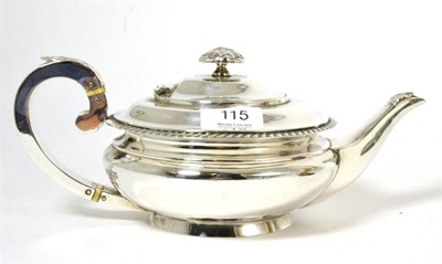 Lot 115 - A silver teapot of compressed form, London 1908