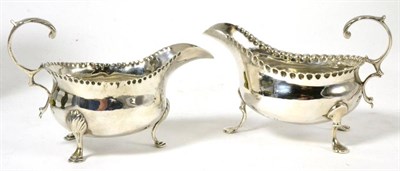 Lot 126 - A pair of George III silver sauce boats, London 1770