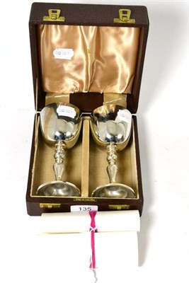 Lot 135 - A cased pair of silver goblets by Garrard, London, 1972, made to commemorate the silver wedding...
