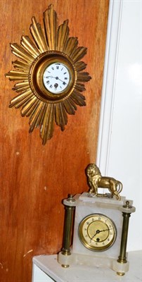 Lot 154 - A mantel timepiece and a sunburst wall timepiece