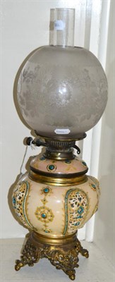 Lot 160 - A late 19th century Zsolnay Pecs style reticulated ceramic and gilt metal oil lamp with etched...