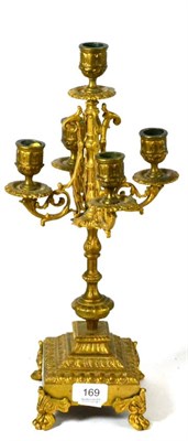 Lot 169 - A gilt bronze four branch candelabra