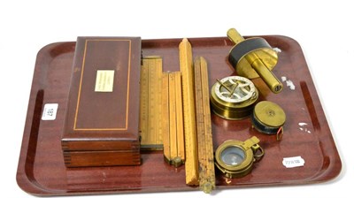 Lot 187 - A tray of scientific instruments including a Farrow and Jackson hydrometer, folding and slide...