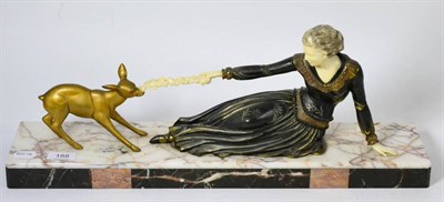 Lot 188 - 1930's Art Deco figure group, reclining woman with fawn, signed Menneville