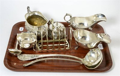 Lot 190 - A tray of silver and silver plate including two silver sauce ladles, silver bowl, etc