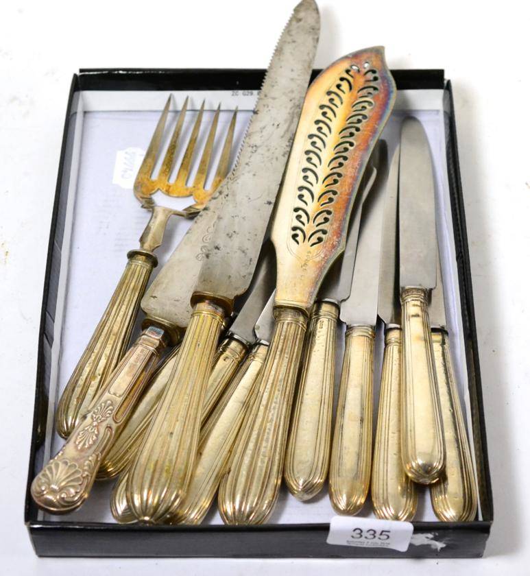 Lot 335 - Eight silver handled knives, bread knife, fish slice and two forks