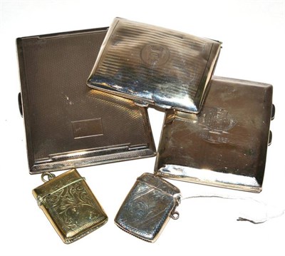 Lot 5 - Three silver cigarette cases, a silver vesta and a white metal vesta