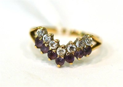 Lot 13 - A 9ct gold dress ring