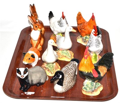 Lot 45 - John Beswick animal figurines comprising: two cockerels, two hens, two geese, a Canadian goose,...